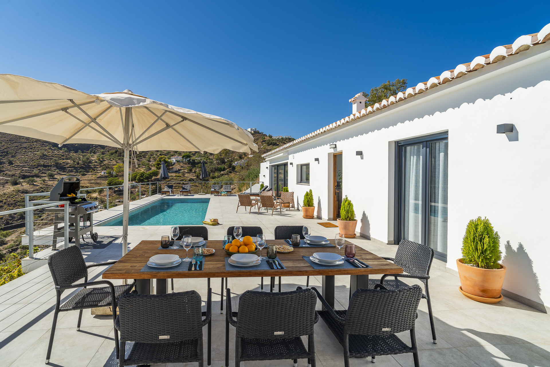 Terrace dining area by the pool